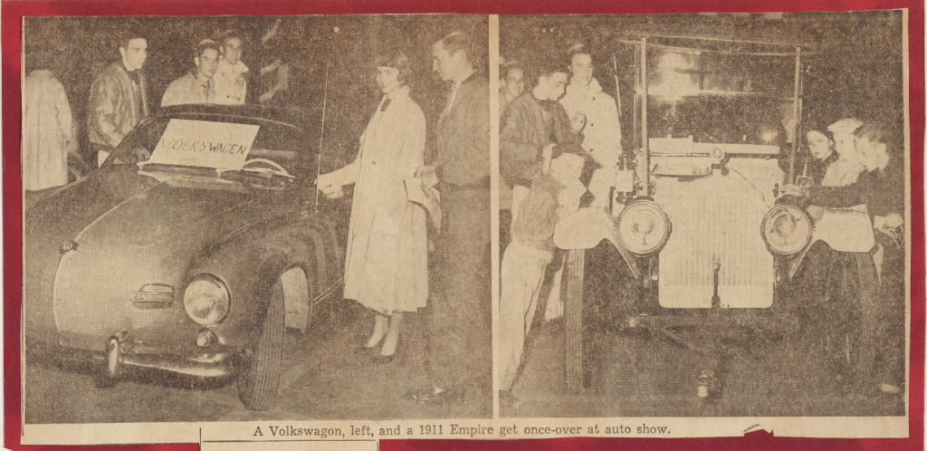 Newspaper clipping with pictures of club members displaying a Volkswagon car on one side and a 1911 Empire on the other. 